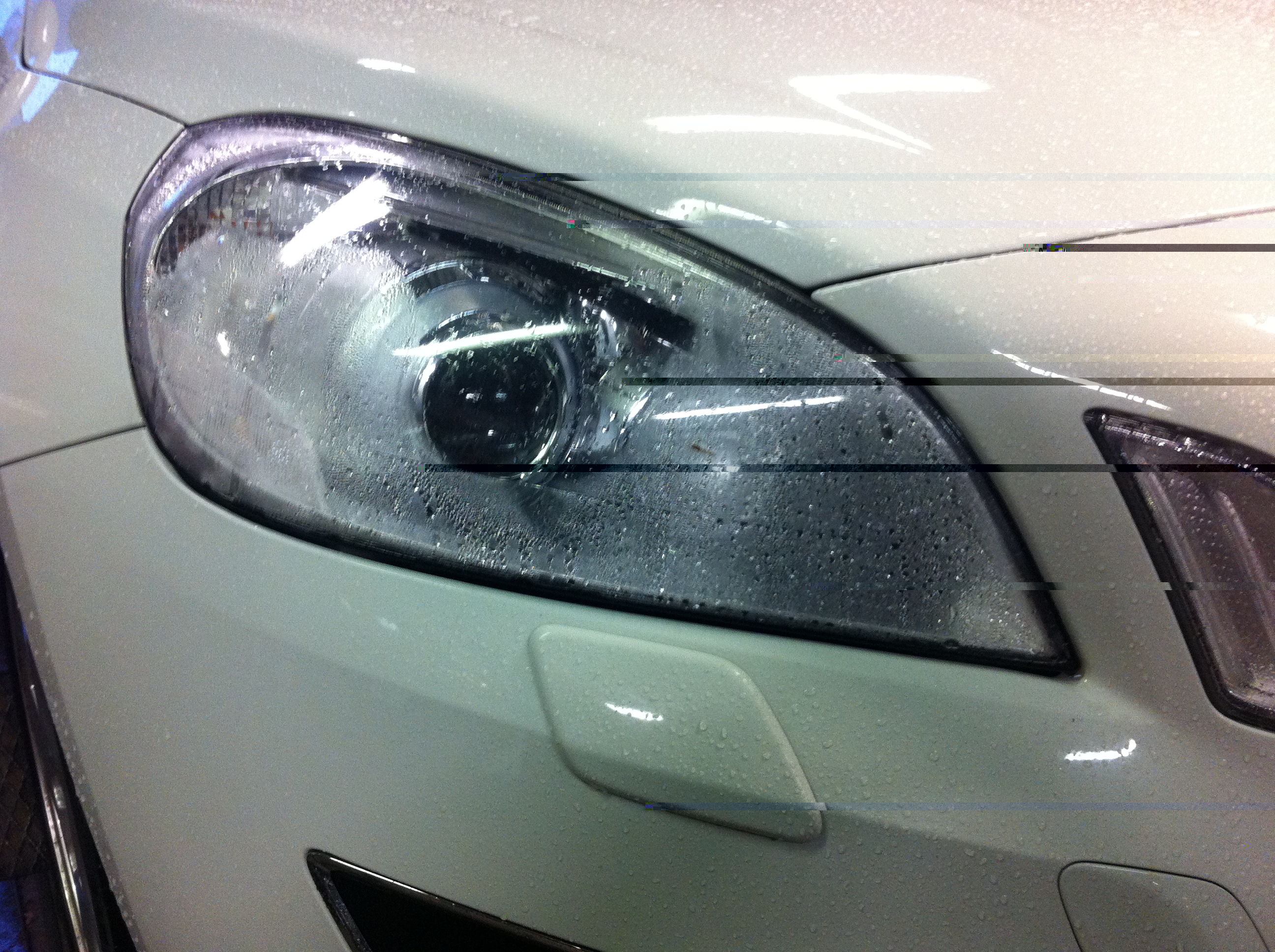 Kondens i strålkastare.JPG